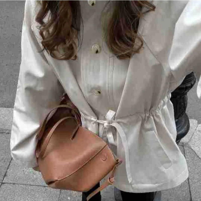 Veste à col montant et taille nouée Mina