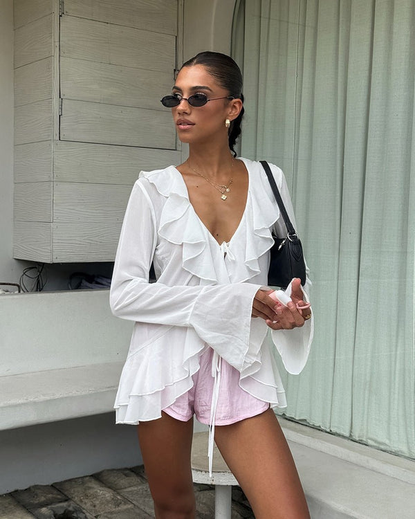 Top Desiree à décolleté profond et volants