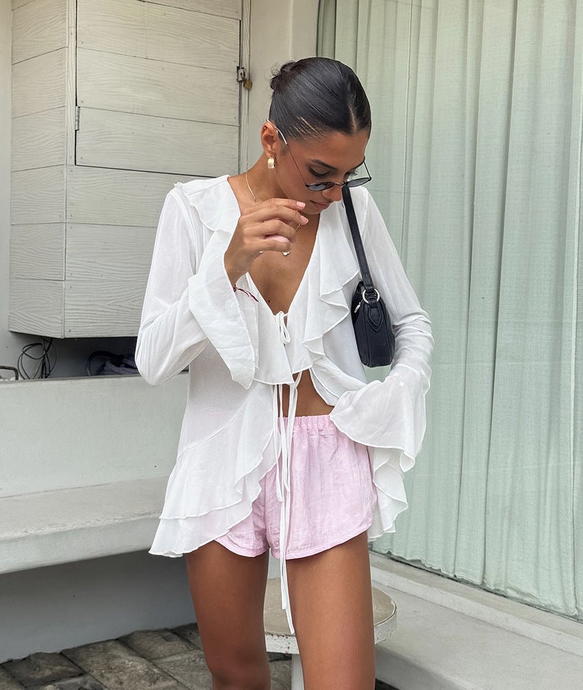 Top Desiree à décolleté profond et volants