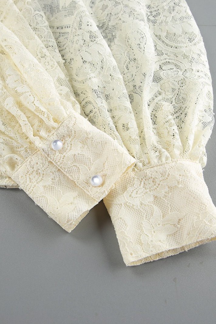 Blouse transparente en dentelle à nouer Dunja