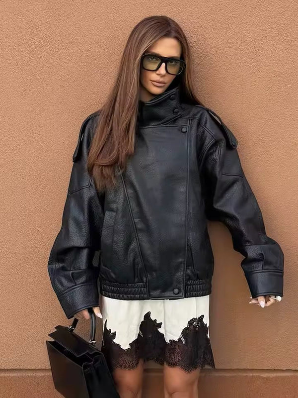 Veste Elena asymétrique à boutons et poches