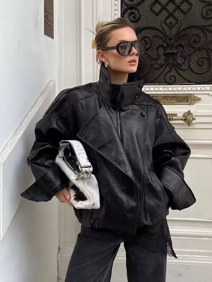 Veste Elena asymétrique à boutons et poches