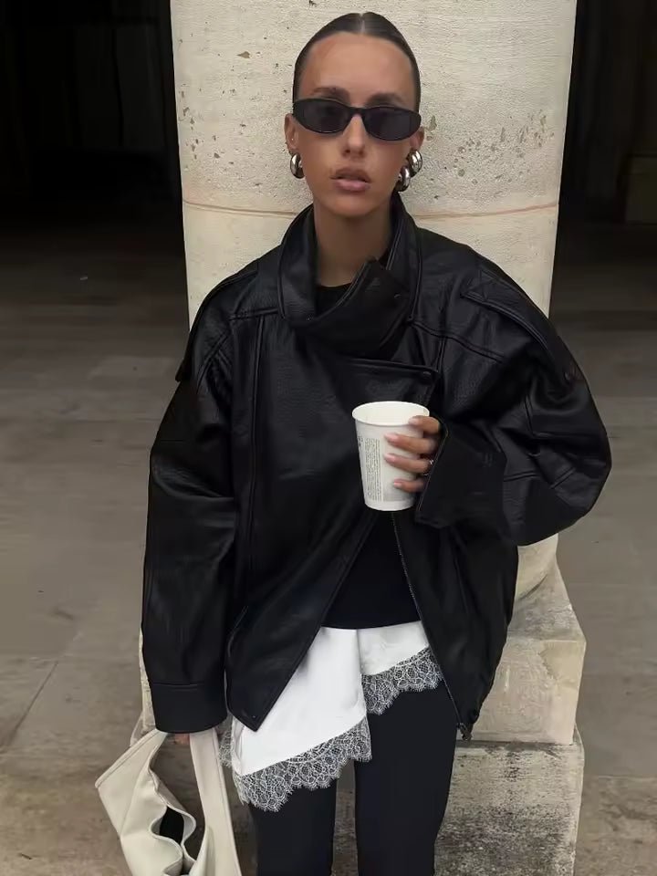 Veste Elena asymétrique à boutons et poches