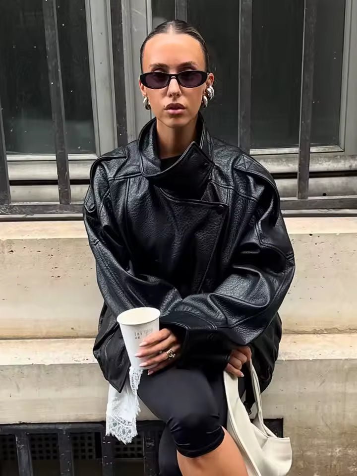 Veste Elena asymétrique à boutons et poches
