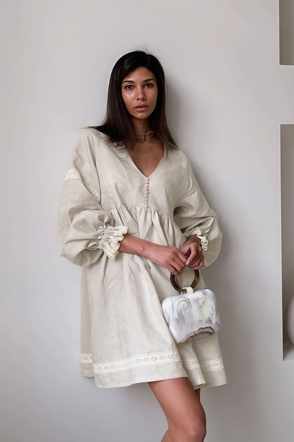 Mini-robe Femke à encolure en V et manches bouffantes