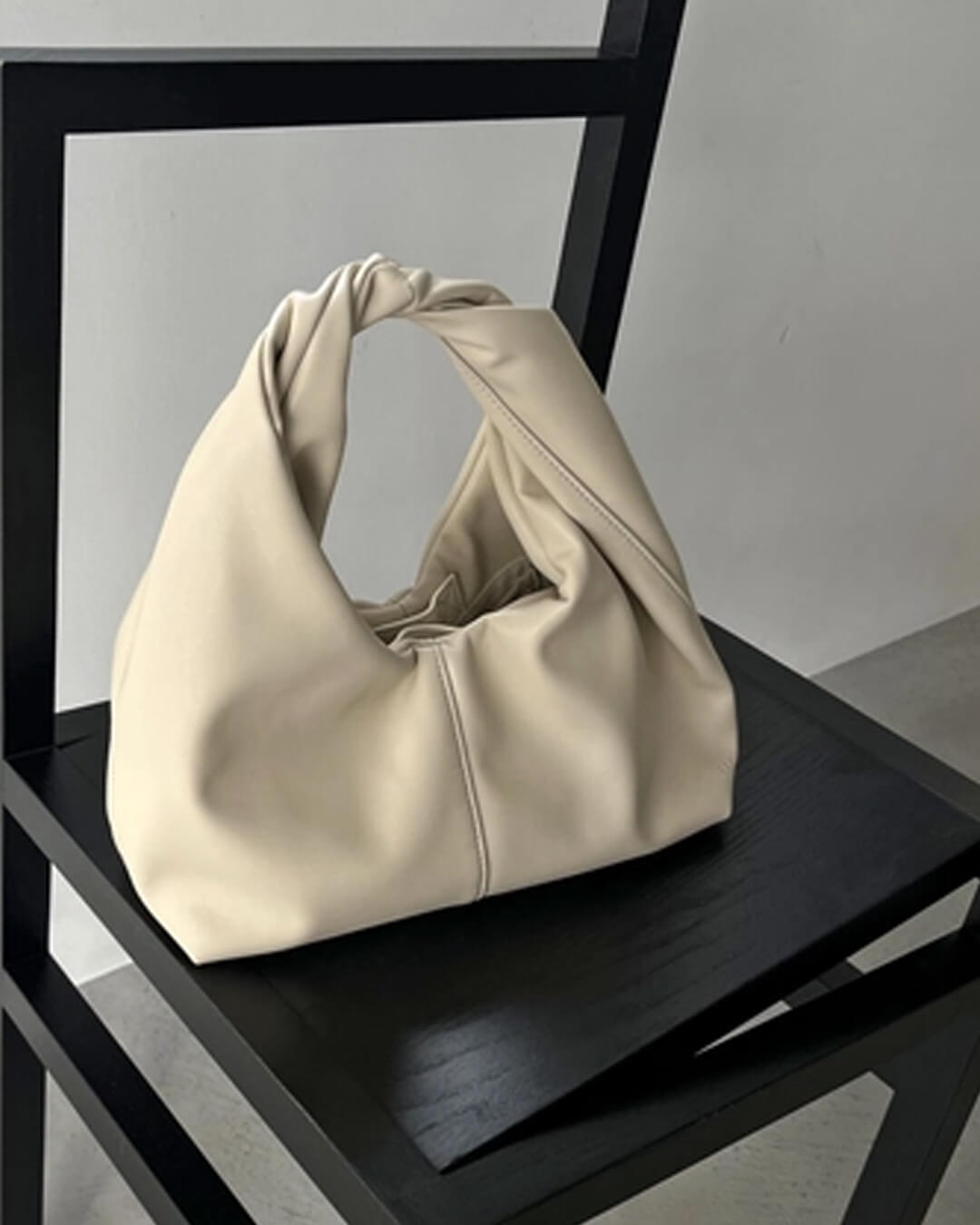 Sac pochette en cuir Gelyn