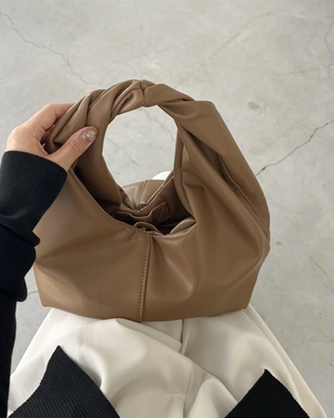 Sac pochette en cuir Gelyn