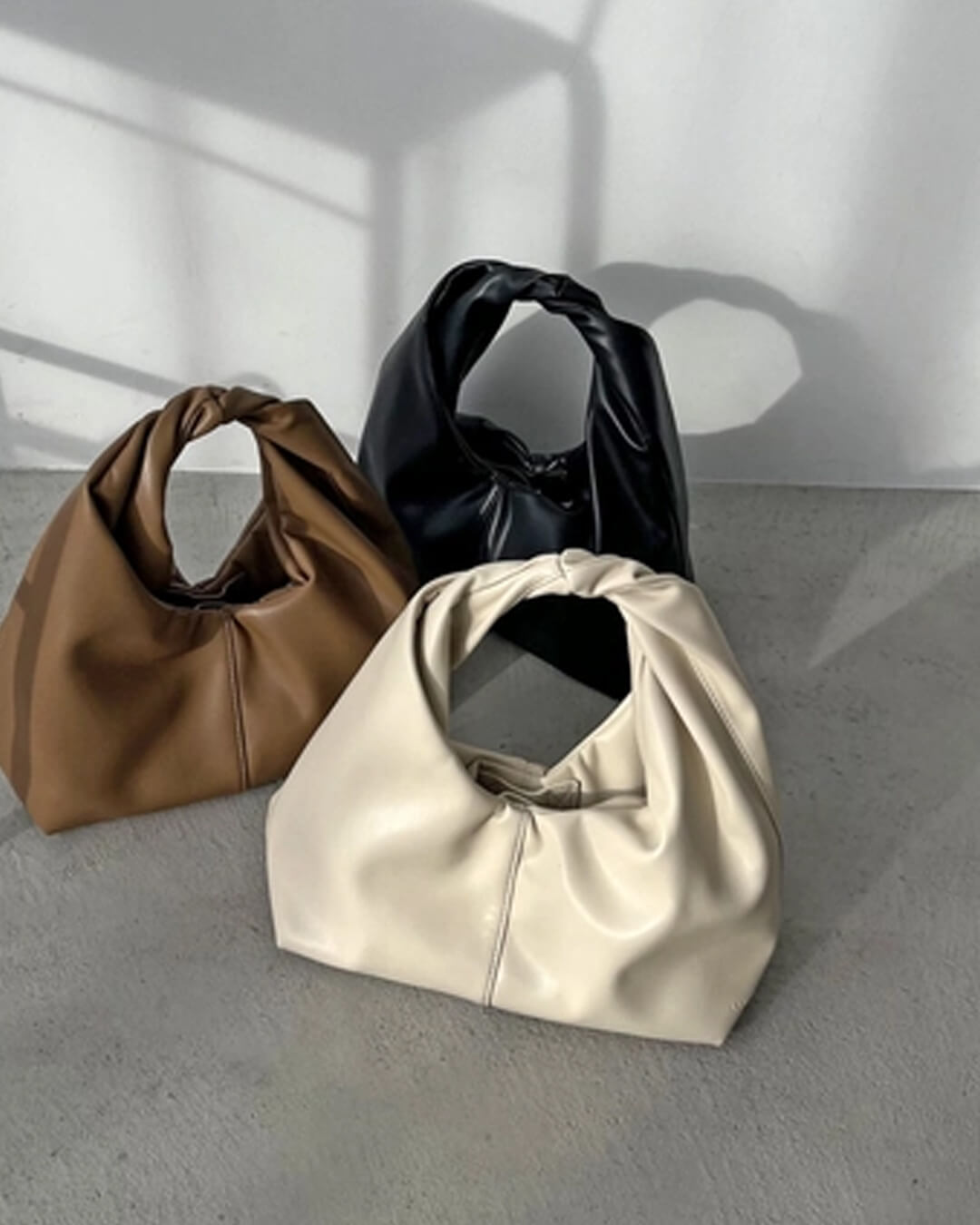 Sac pochette en cuir Gelyn