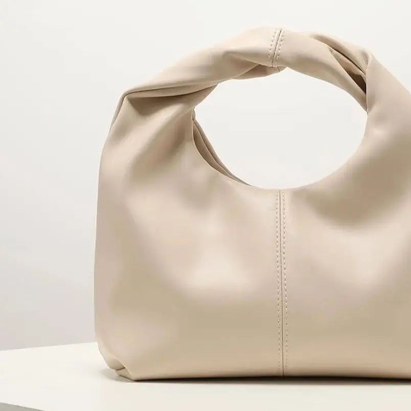 Sac pochette en cuir Gelyn