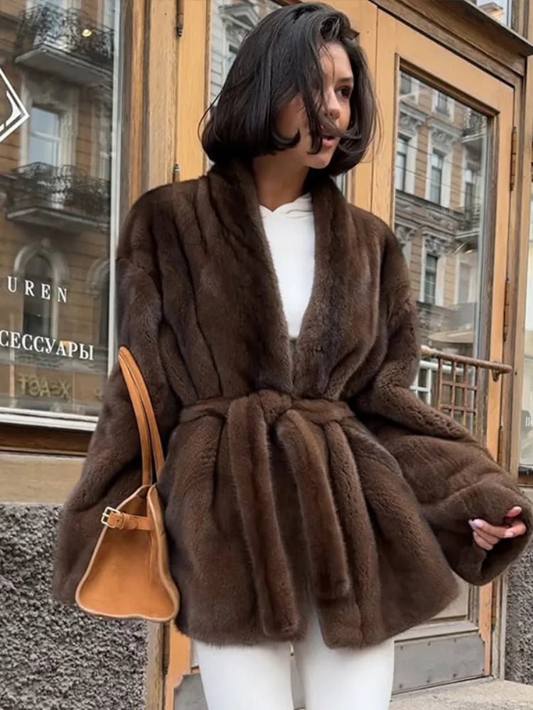 Veste en fausse fourrure couleur noisette avec ceinture