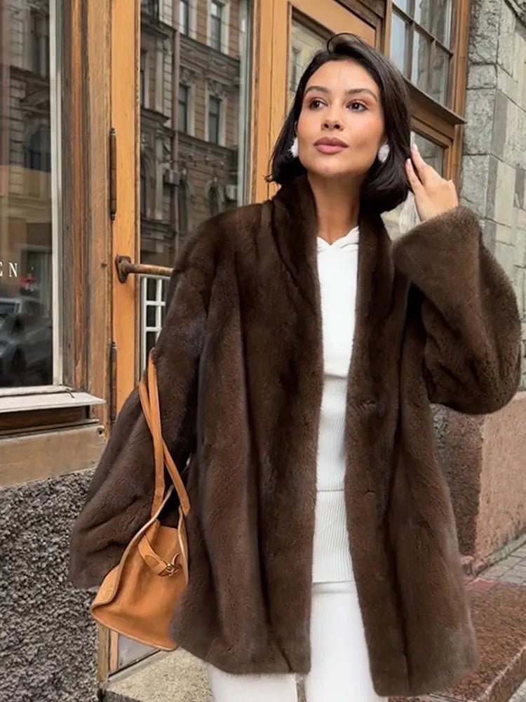 Veste en fausse fourrure couleur noisette avec ceinture