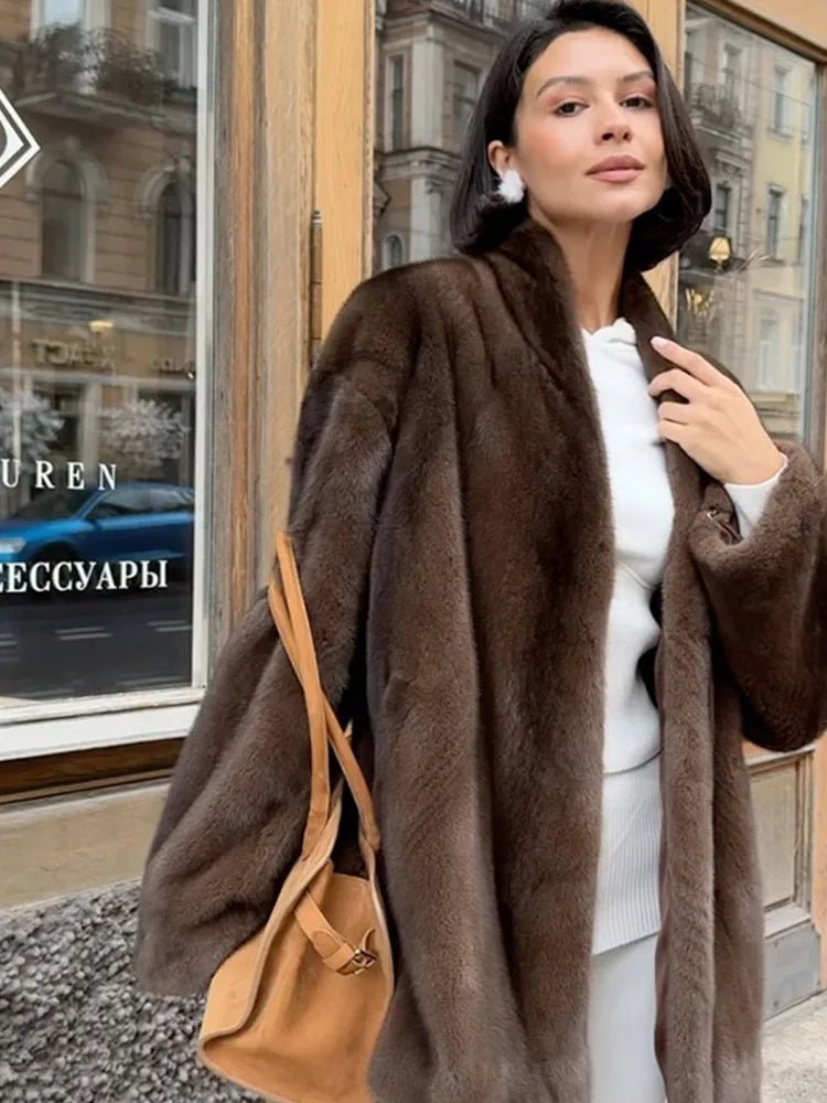 Veste en fausse fourrure couleur noisette avec ceinture