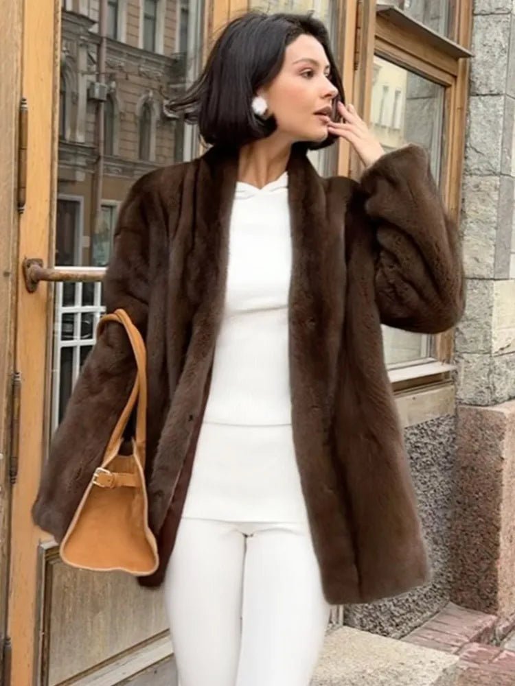 Veste en fausse fourrure couleur noisette avec ceinture