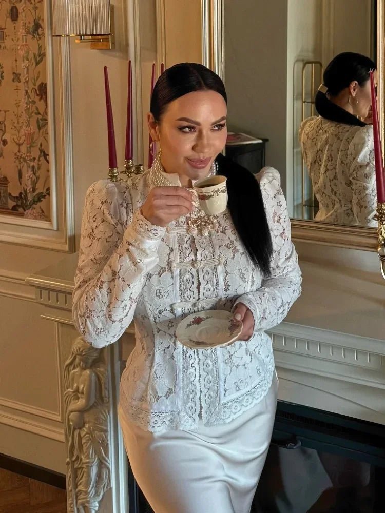 Blouse en dentelle à manches bouffantes Katalina