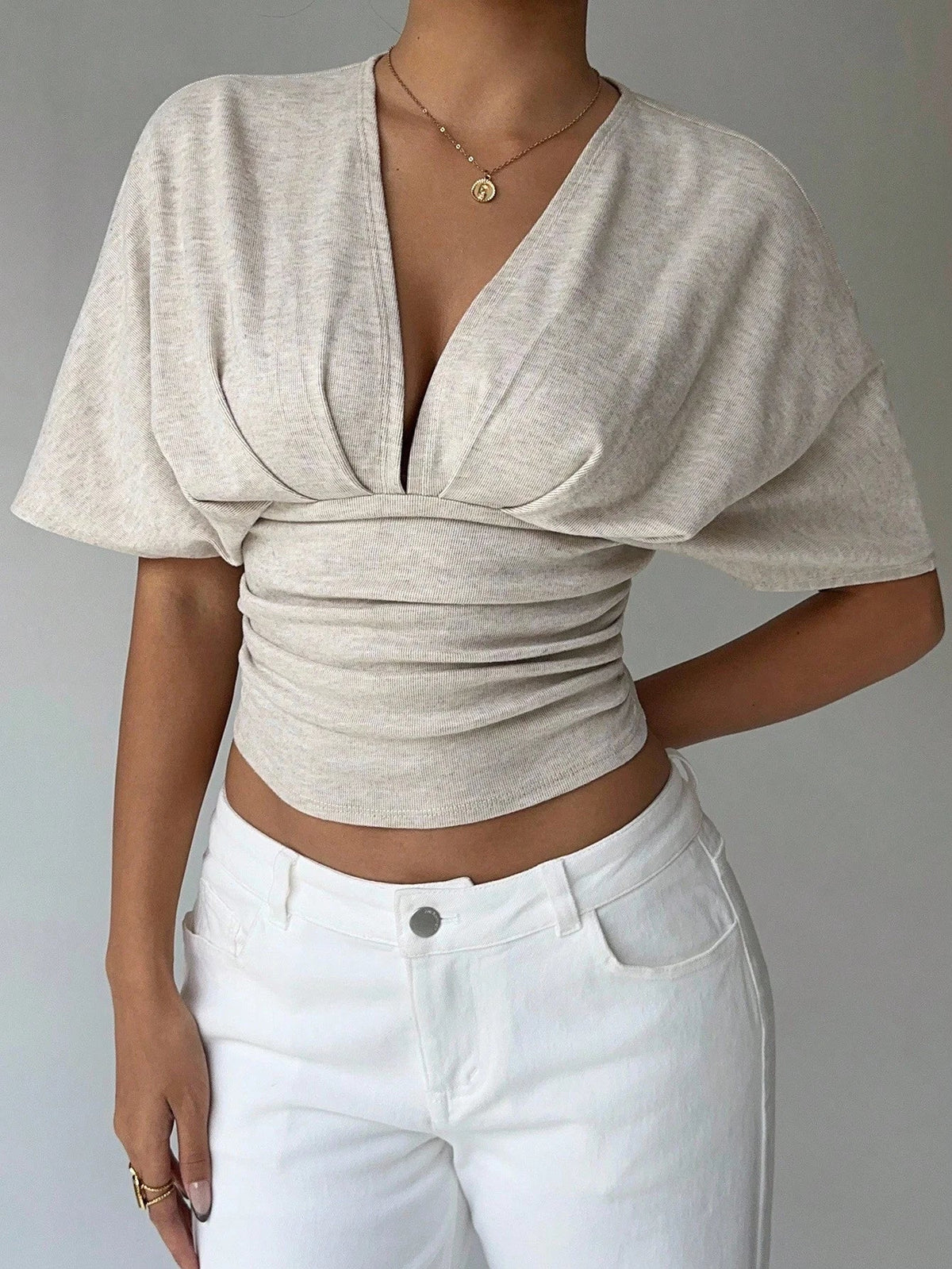 Blouse ajustée Kendra à décolleté plongeant