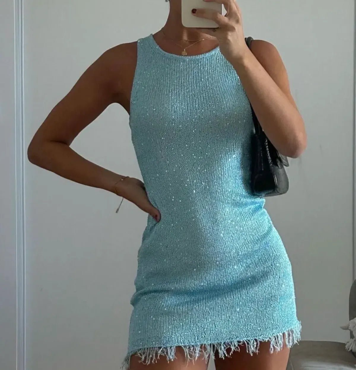 Mini-robe courte sans manches transparente Lia