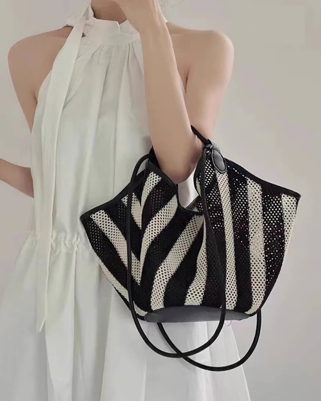 Sac bandoulière tressé Liam