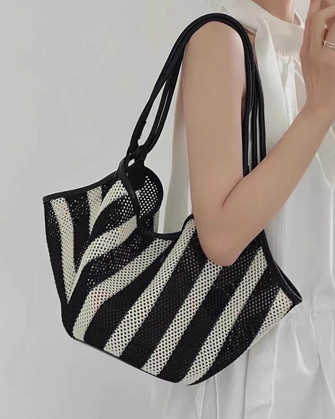 Sac bandoulière tressé Liam