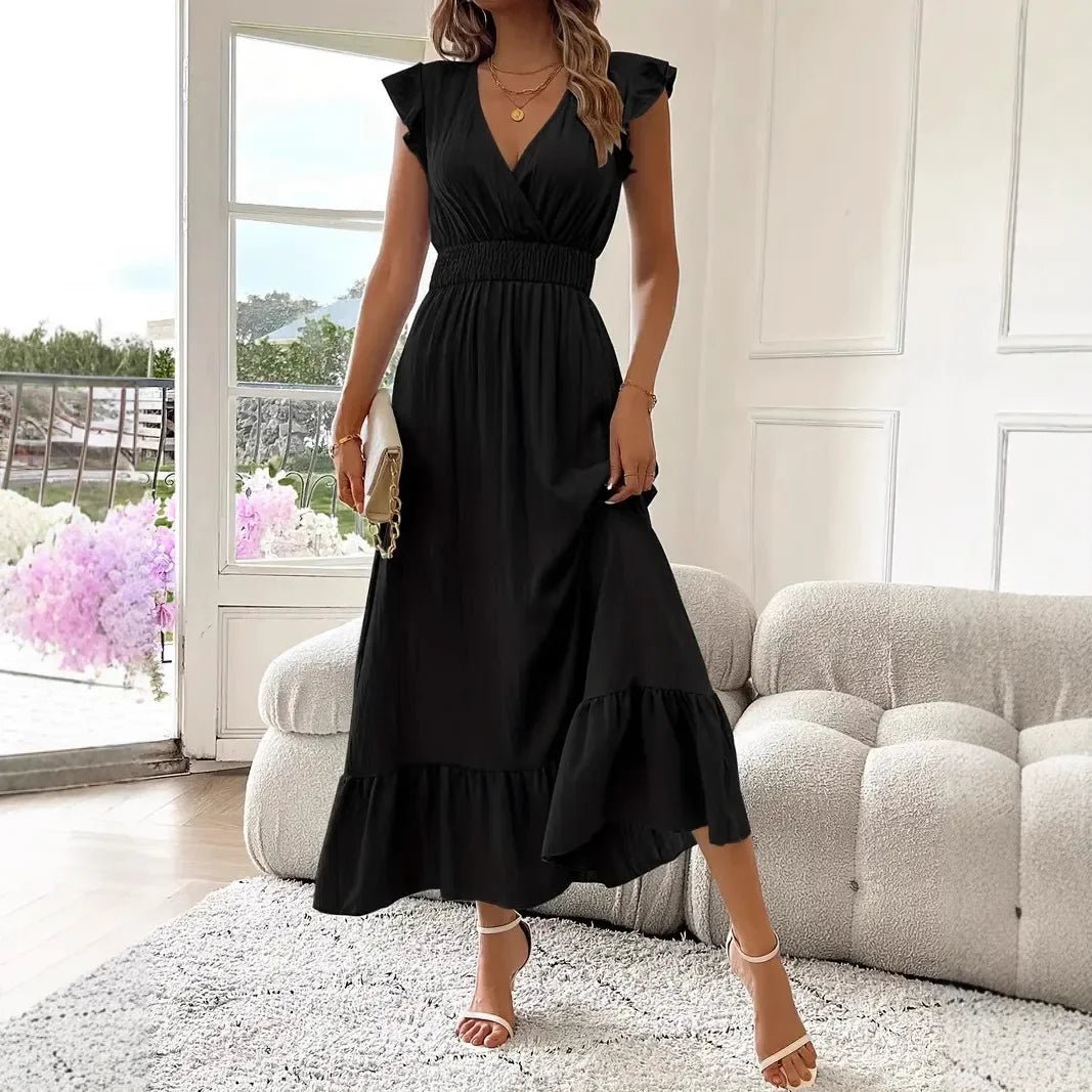 Robe patineuse noire Livia à col V et volants