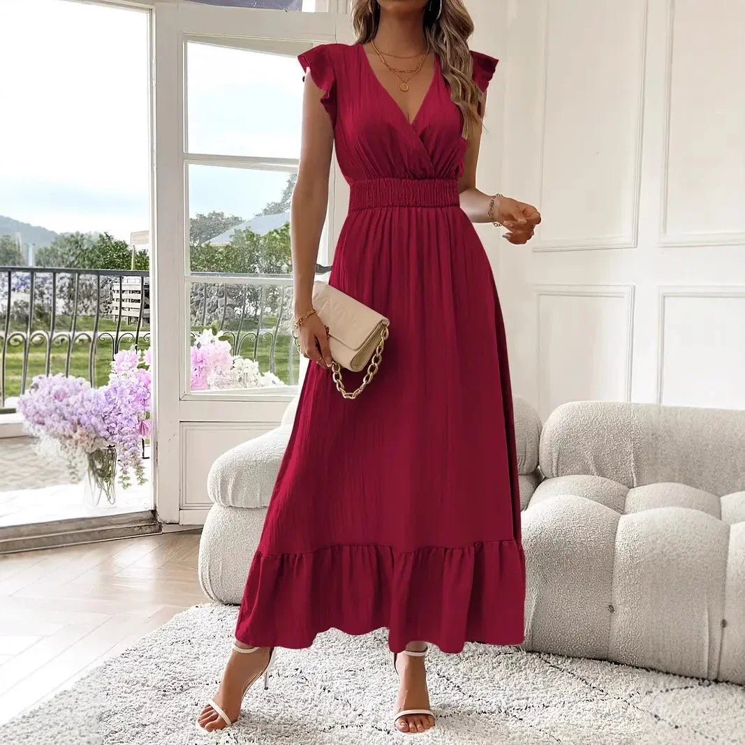 Robe patineuse noire Livia à col V et volants
