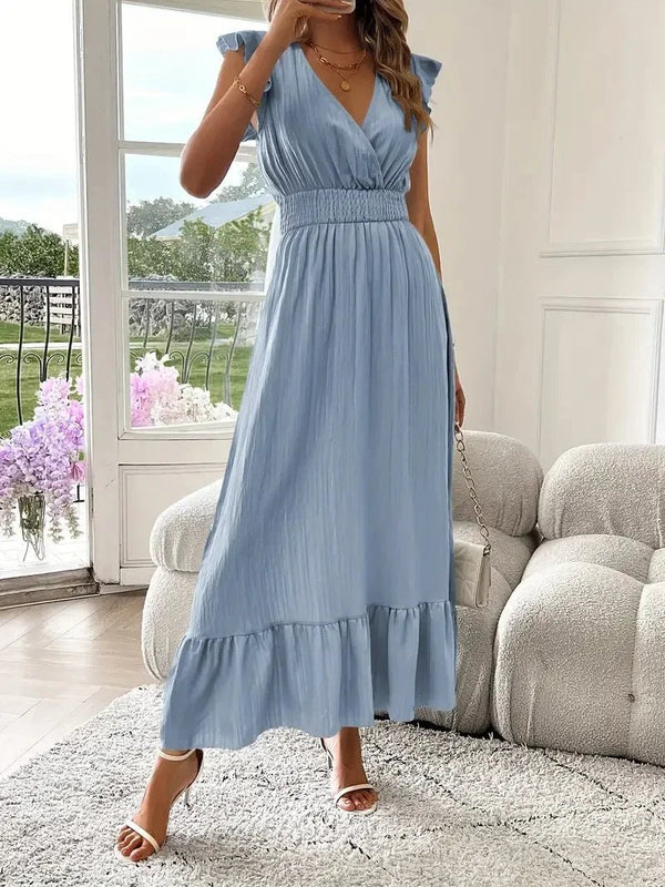 Robe patineuse noire Livia à col V et volants