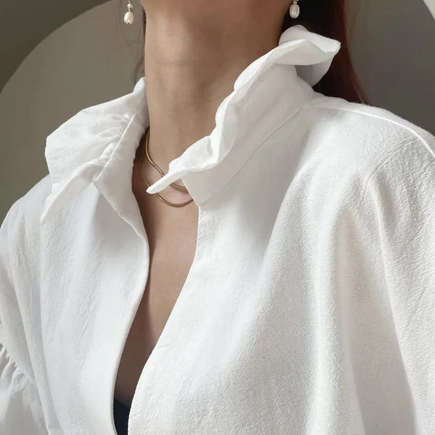 Blouse Lola à manches longues bouffantes et col en V