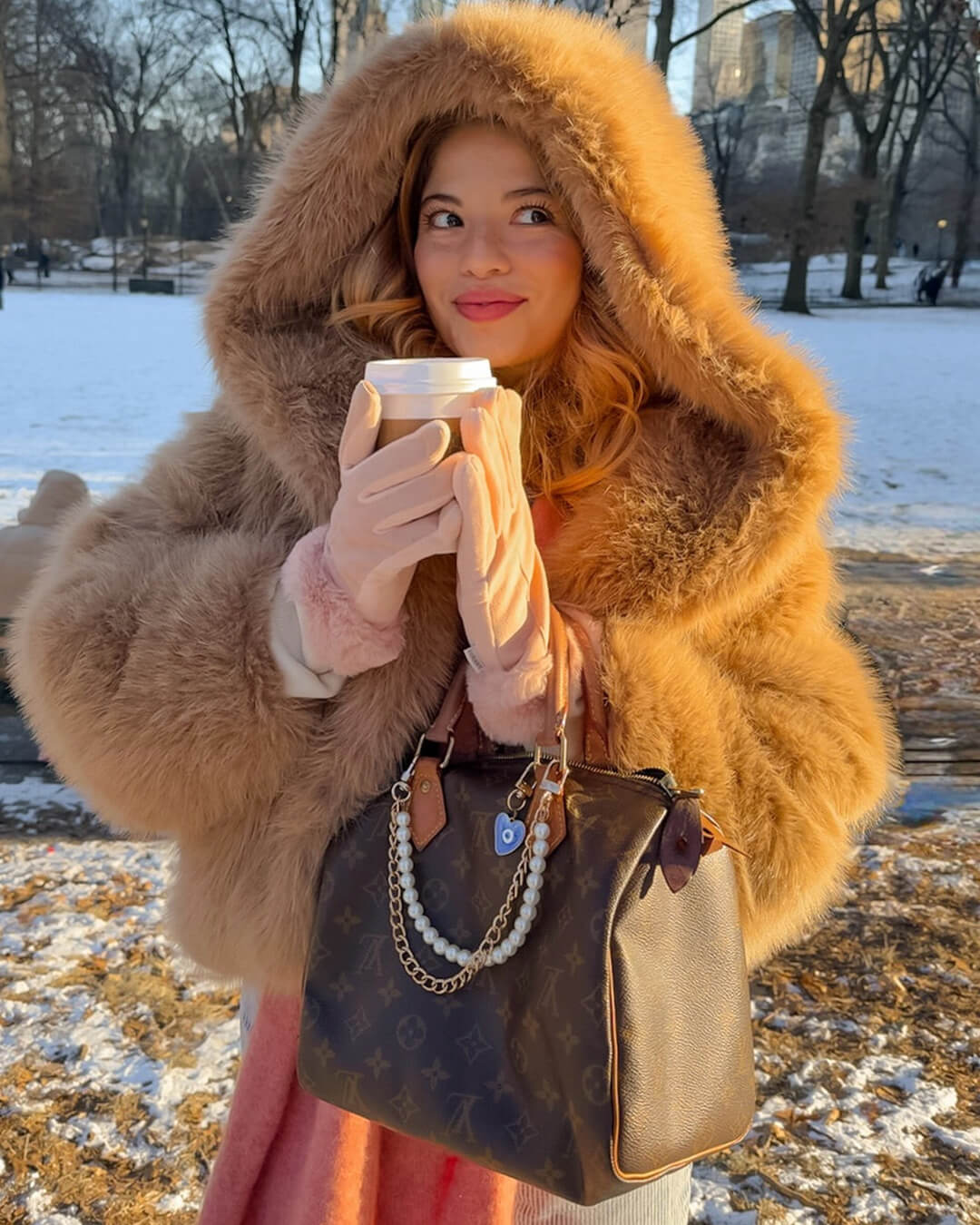 Manteau à capuche en fausse fourrure Nicki