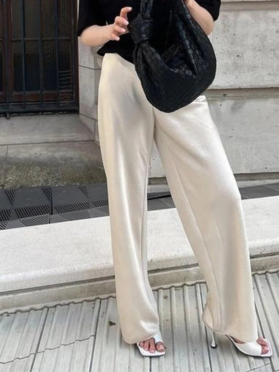 Pantalon Norma taille haute en satin à jambes larges