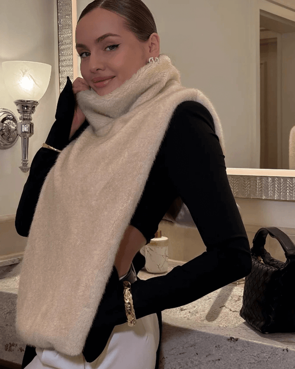 Gilet à col roulé en fausse fourrure Rina