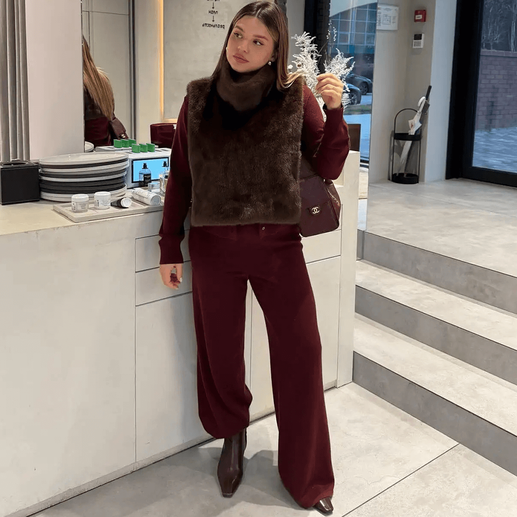 Gilet à col roulé en fausse fourrure Rina