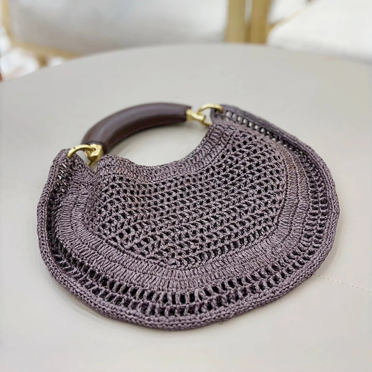 Sac tressé en forme de croissant Sabine