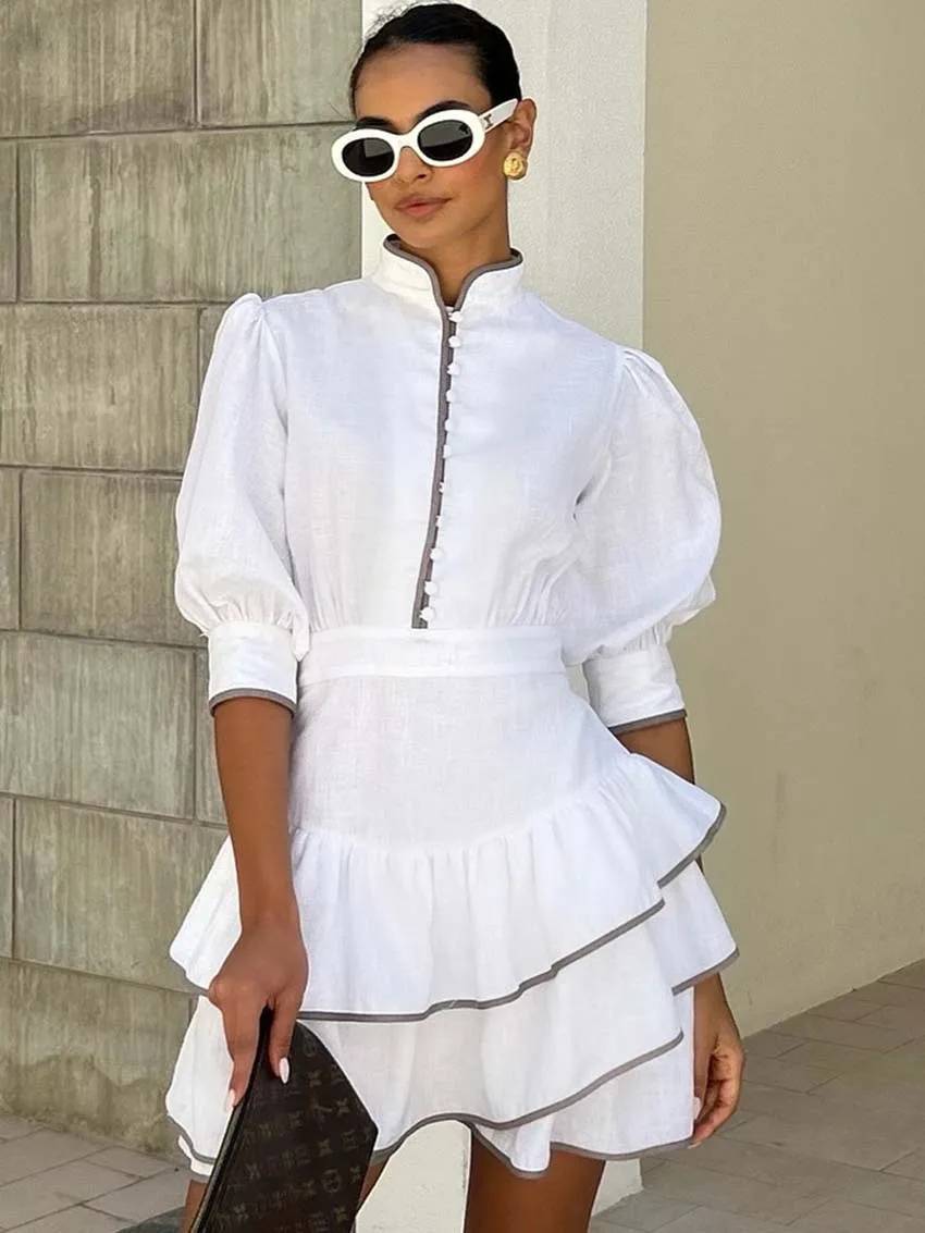 Mini-robe Sara à col roulé et empiècements