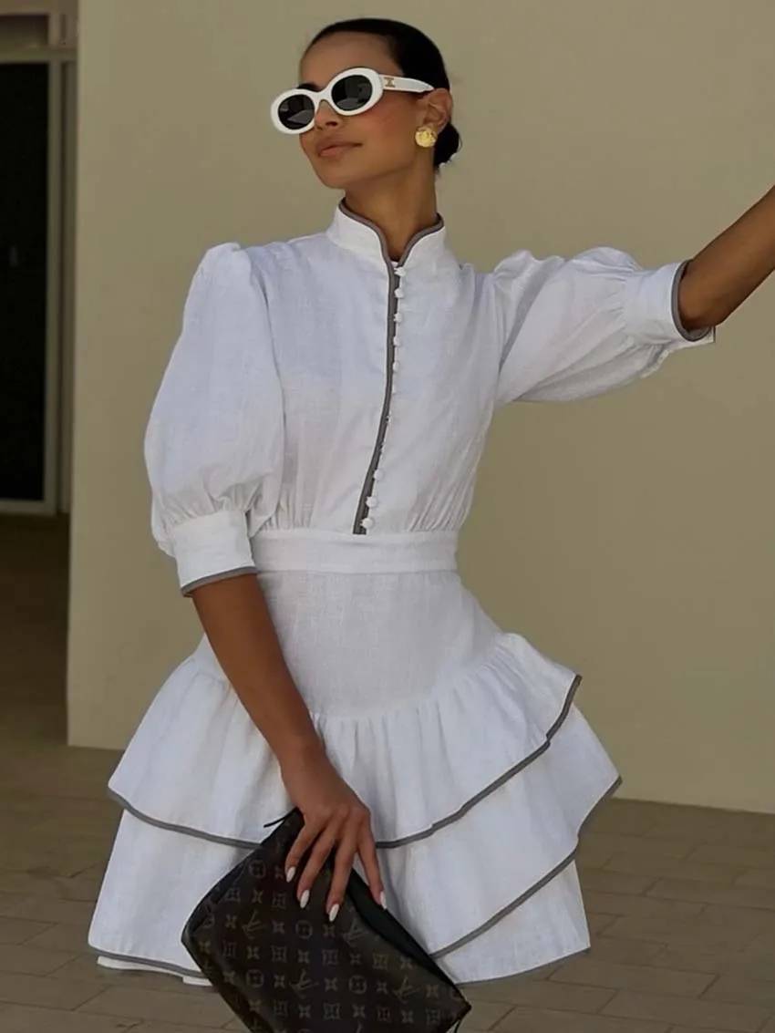 Mini-robe Sara à col roulé et empiècements