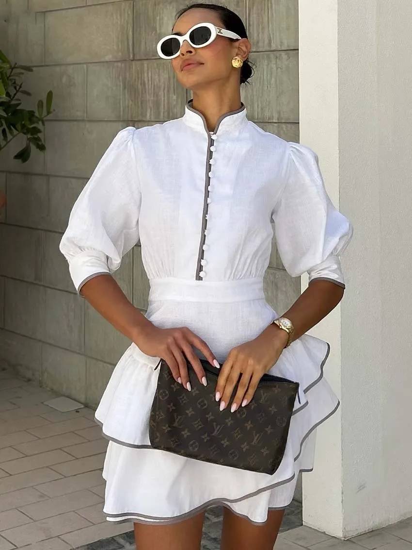 Mini-robe Sara à col roulé et empiècements