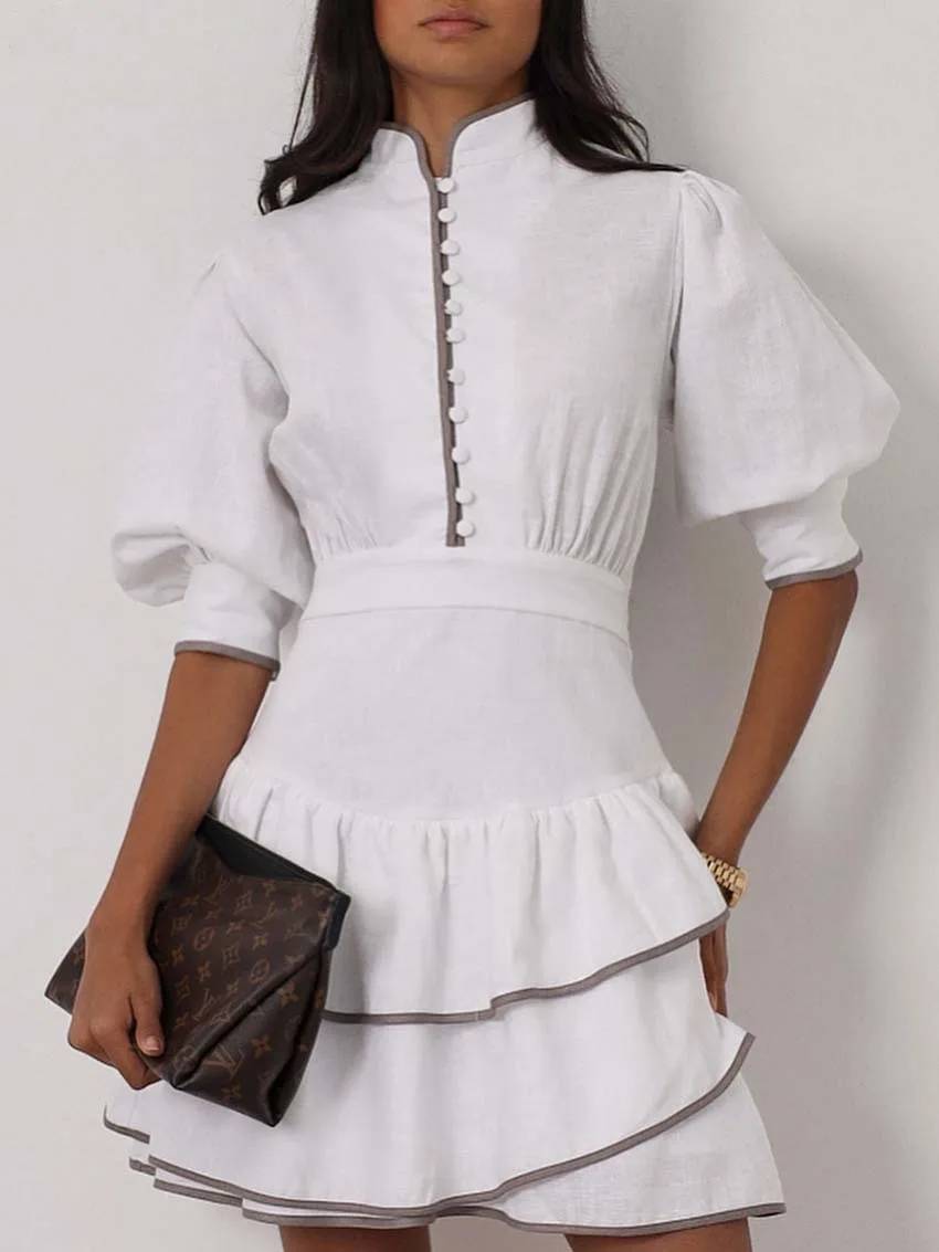 Mini-robe Sara à col roulé et empiècements