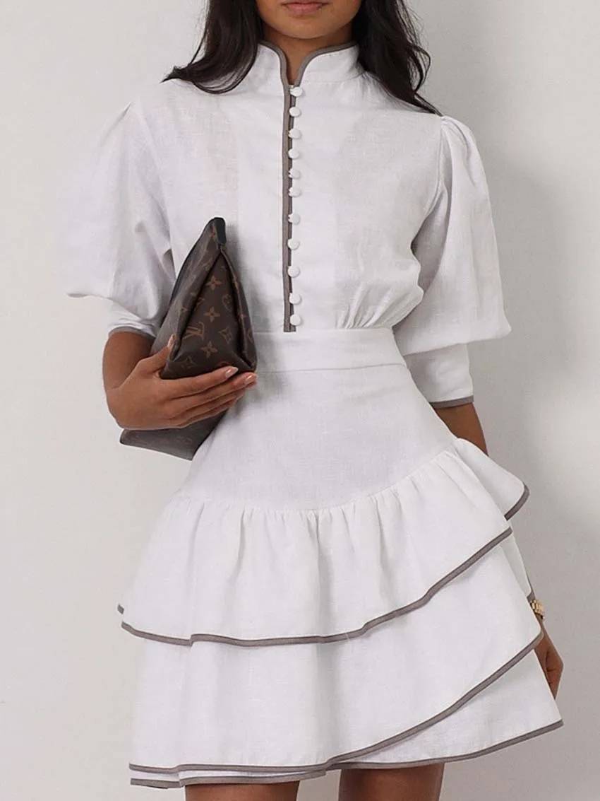 Mini-robe Sara à col roulé et empiècements