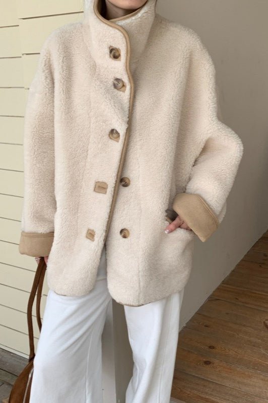 Manteau en fausse fourrure à col montant Vanya