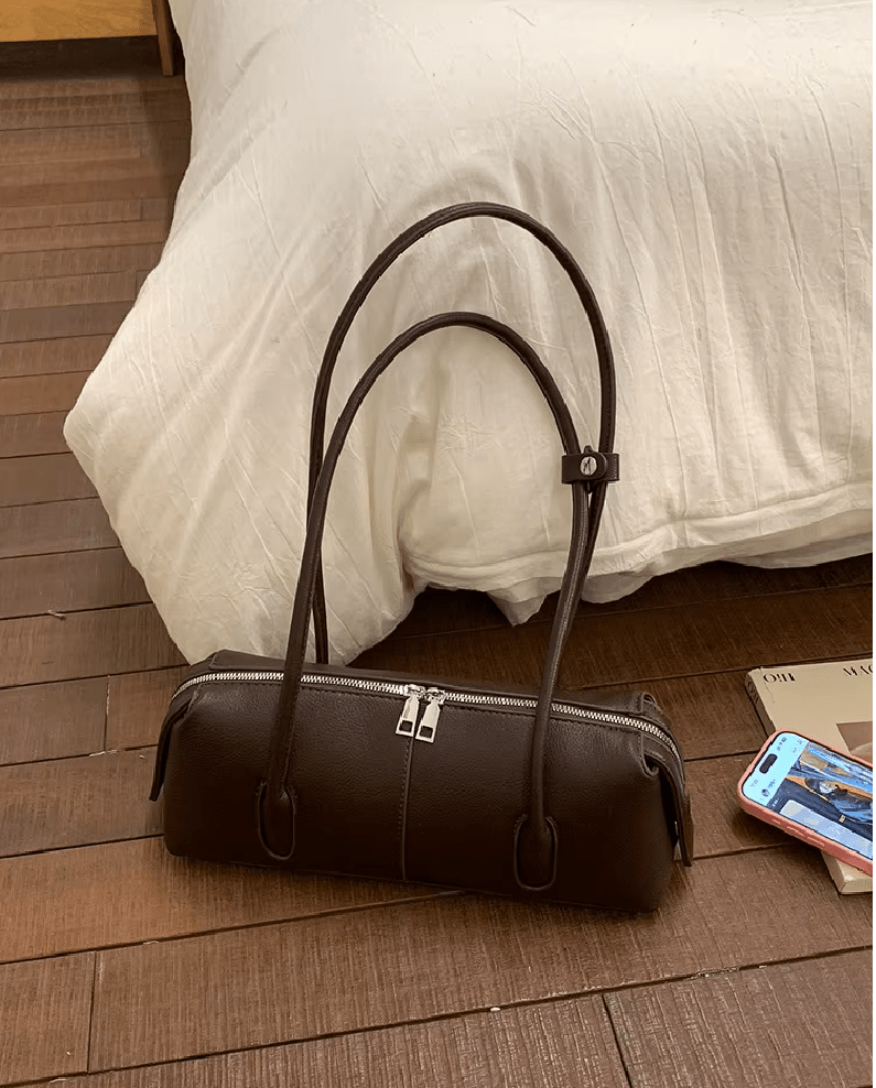 Mira Cylinder Shoulder Bag in dark brown – styled look